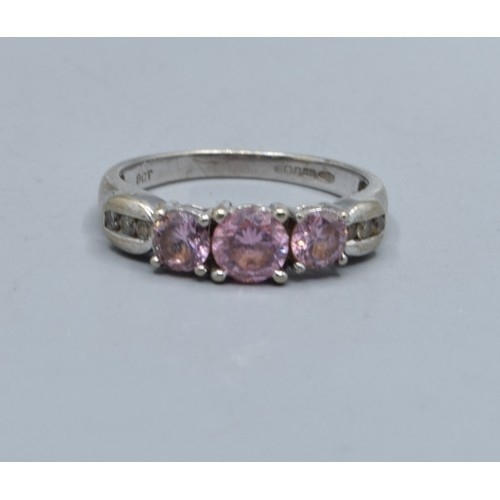 548 - 9ct white gold Pink sapphire and accent Diamond decorated 3 stone ring size N, 2.5grams