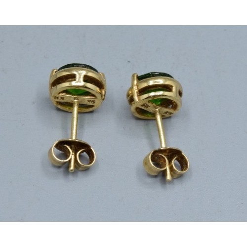 525 - 9ct gold Diopside stud earrings held in an enclosed claw setting 7mm diameter