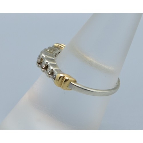 545 - 9ct gold ladies 7 stone Diamond ring in a stepped design and hallmarked as 0.25cts in an enclosed se... 