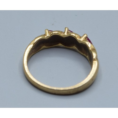621 - 9ct gold vintage ladies Ruby and Diamond twist design ring hallmarked in the ring as Diamond size M