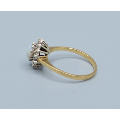 503 - 9ct gold ladies vintage Opal and Diamond halo cluster ring size N,