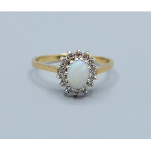 503 - 9ct gold ladies vintage Opal and Diamond halo cluster ring size N,
