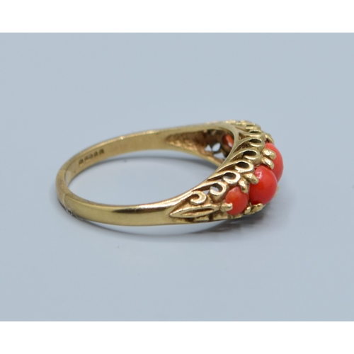 505 - Vintage 9ct gold 5 stone Coral ring held in an open work scroll design size P, 2.9grams
