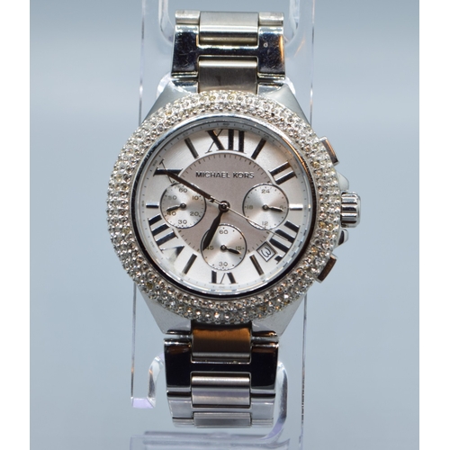 508 - Gents Michael Kors fashion watch with subsidiary dials and sweep second hand on a stainless steel st... 