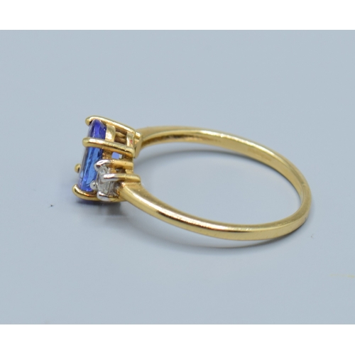 513 - 9ct gold ladies oval Amethyst and clear gem set 3 stone dress ring size O