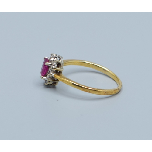 515 - 9ct gold ladies Ruby and Diamond halo cluster ring hallmarked as Diamond in the ring size M