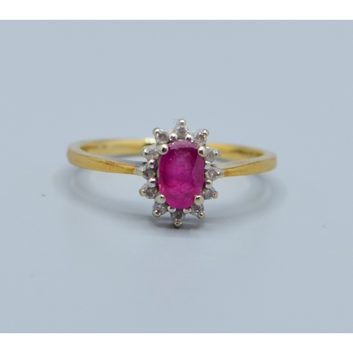 515 - 9ct gold ladies Ruby and Diamond halo cluster ring hallmarked as Diamond in the ring size M