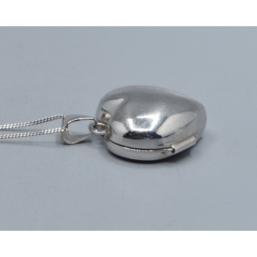553 - 9ct white gold Heart picture locket on a 9ct white gold neck chain 40cm long
