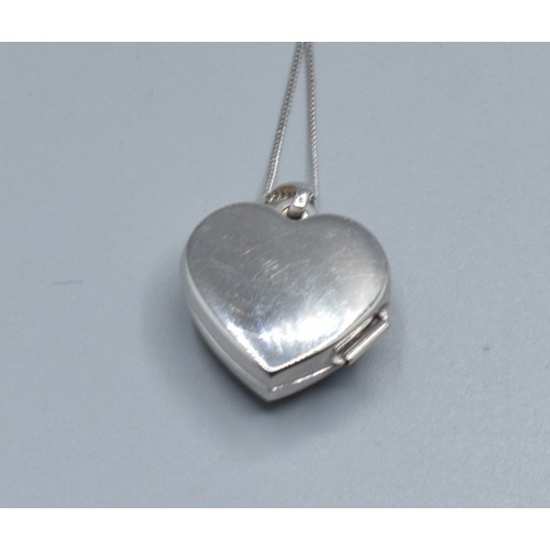 553 - 9ct white gold Heart picture locket on a 9ct white gold neck chain 40cm long
