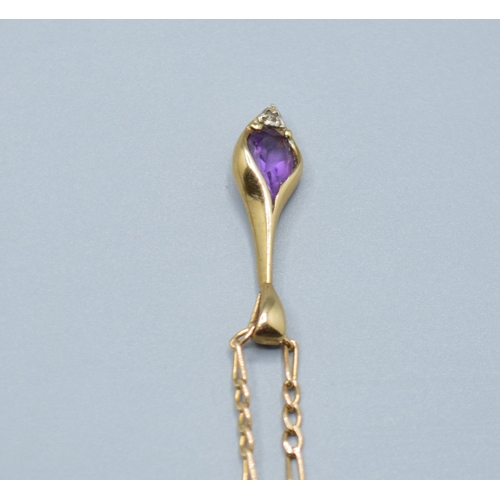 533 - 9ct gold Amethyst and accent Diamond tear drop pendant, pendant being 2.4cm drop on a 9ct gold figar... 
