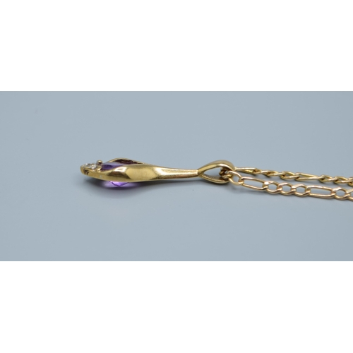 533 - 9ct gold Amethyst and accent Diamond tear drop pendant, pendant being 2.4cm drop on a 9ct gold figar... 