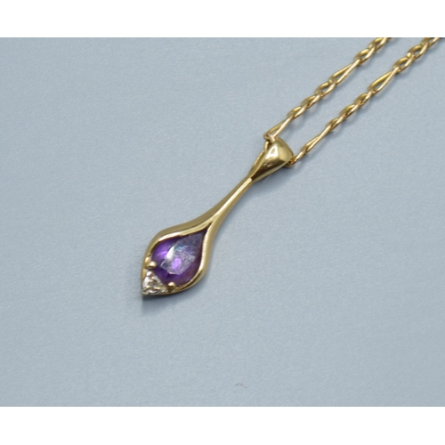 533 - 9ct gold Amethyst and accent Diamond tear drop pendant, pendant being 2.4cm drop on a 9ct gold figar... 