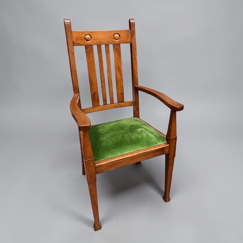 4 - A Victorian Arts & Crafts Oak extending dining table and Chairs.With original winder and two lea... 
