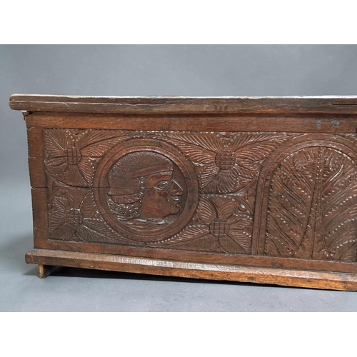6 - A late Elizabethan Oak marriage chest.With carved portrait medallions and stylised designs.Late 16th... 