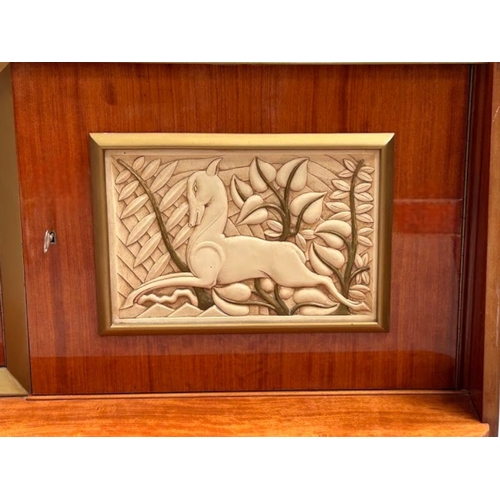 11 - A large Italian Mid-century Dresser sideboard.Circa 1960.multiple wood veneers with carved Deer moti... 