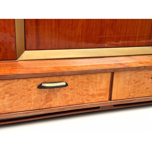 11 - A large Italian Mid-century Dresser sideboard.Circa 1960.multiple wood veneers with carved Deer moti... 
