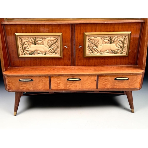 12 - A large Italian Mid-century Vitrine cabinetCirca 1960.multiple wood veneers with carved Deer motif p... 
