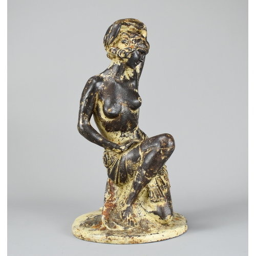 21 - A French Art Deco painted cast Iron semi-nude figure.Height - 33cm