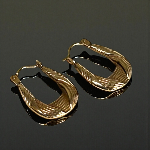 22 - A pair of 10ct Gold 'Horseshoe' shaped ladies earrings.Stamped 10ct to bars. 22x15mmWeight 1.1g... 