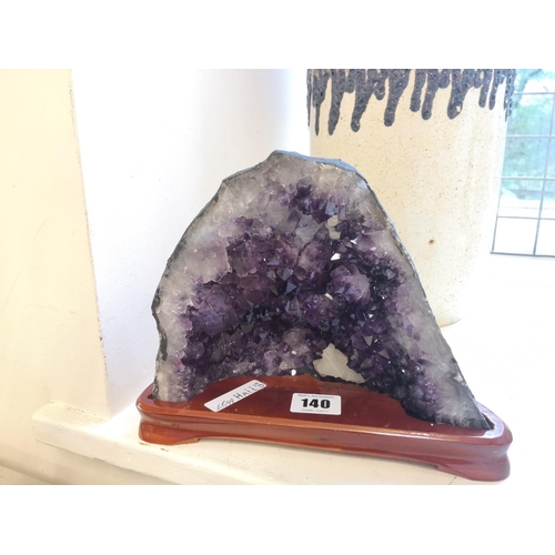 Amethyst specimen on stand