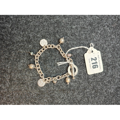 A silver 925 charm bracelet