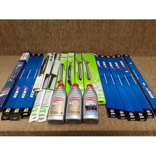 25 - Large quantity of windscreen wiper blades and engine oil