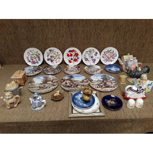 45 - Selection of collectible plates and teapots including Royal Albert