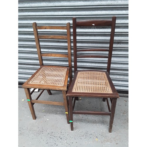 679 - two rattan chairs