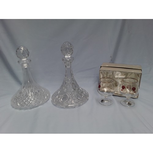 6 - Two crystal port decanters, and a set of Bohemian glass glasses