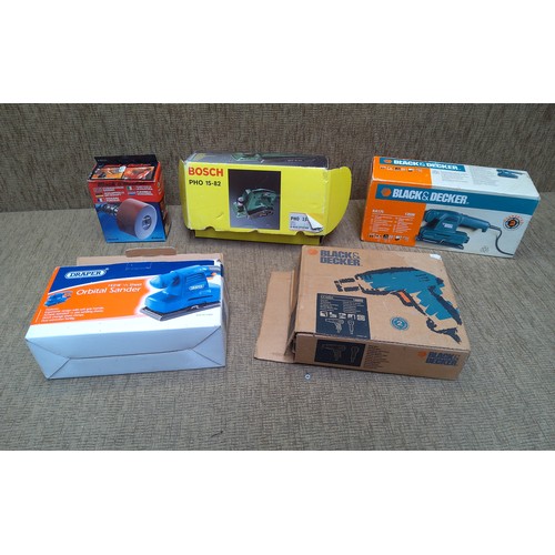 211 - Boxed power tools including Black and Decker sander and Heat gun.