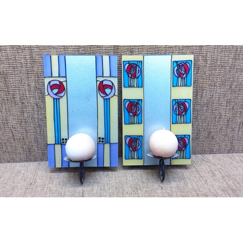 757 - A pair of stained glass candle holders.