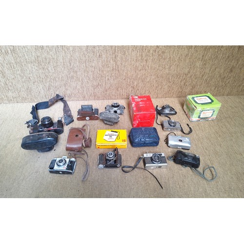 769 - Collection of vintage cameras and accessories including  Praktica Super TL and Kodak instamatic.