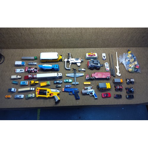 251 - Collection of toys and die-cast cars.