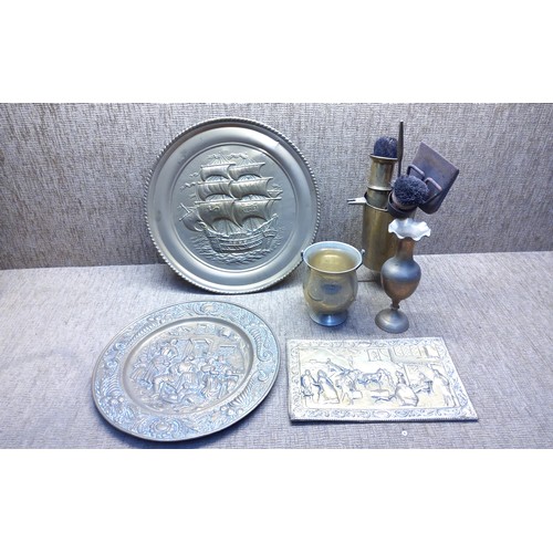 256 - Brass item's including embossed plates and a fireside companion.