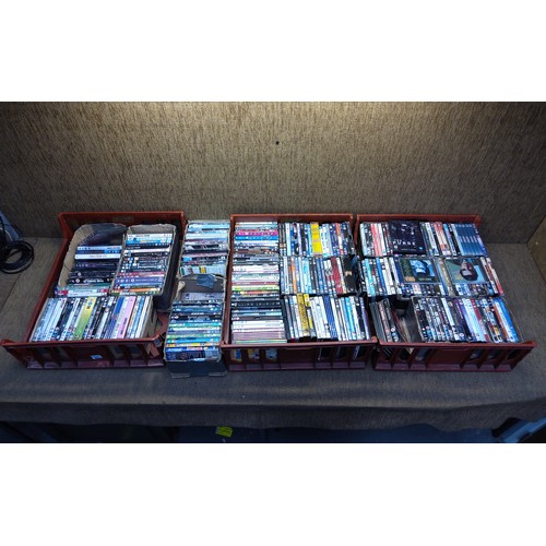 261 - Three large bread crates of DVD's.