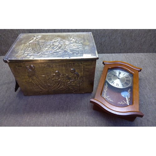 265 - Brass log box and a Quartz wall clock.