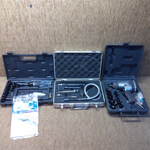 306 - Air compression boxed tools including Air ratchet, and air socket sets.
