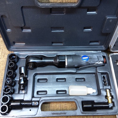 306 - Air compression boxed tools including Air ratchet, and air socket sets.