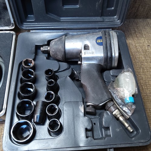 306 - Air compression boxed tools including Air ratchet, and air socket sets.