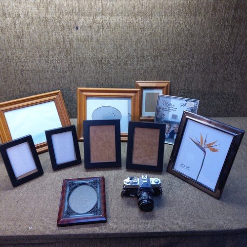307 - Quantity of photo frames and a Yashica TL Electro X Camera.