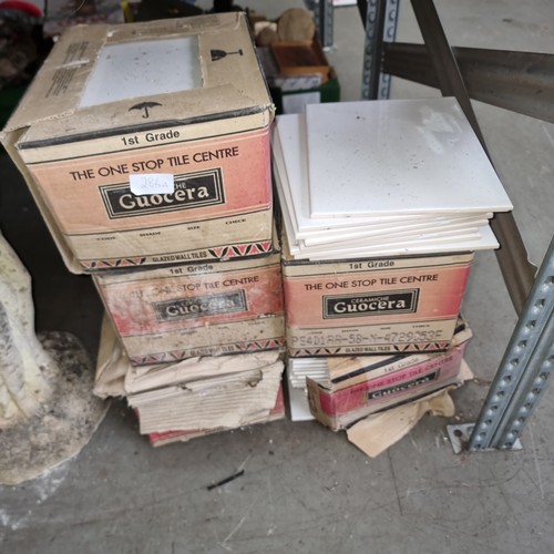 286A - Large quantity of ice white ceramic tiles.