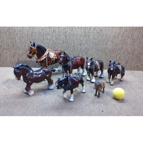 220 - Collection of ceramic Staffordshire Shire horses.