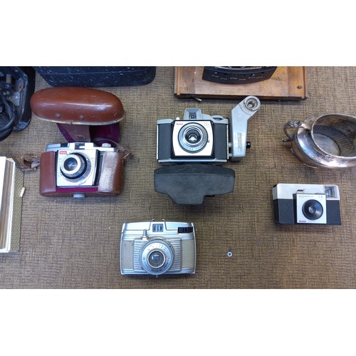 668 - Selection of vintage cameras including Kodak and an Azimuth motor for a Giro compass.