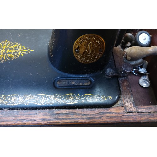 157 - Vintage singer sewing machine.