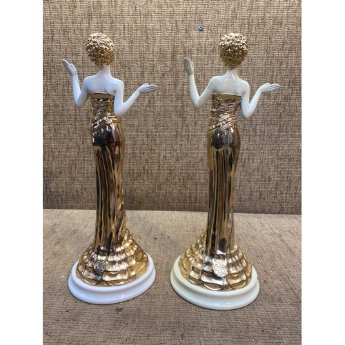 1237 - pair of heavy gold gilded art Nouveau figures 42cm tall.