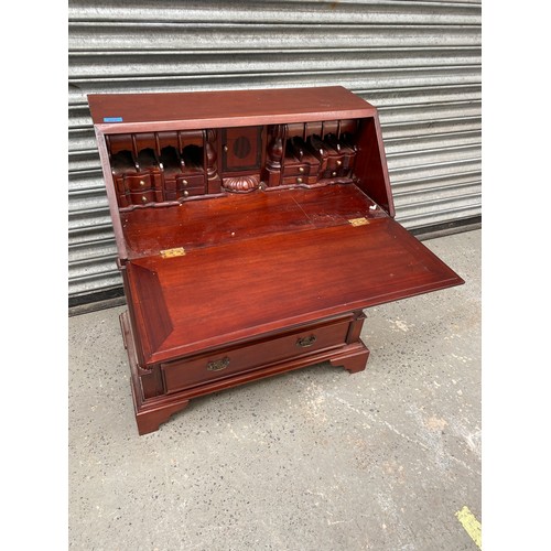 673 - Five drawer beautifully carved 5 drawer writing bureau.