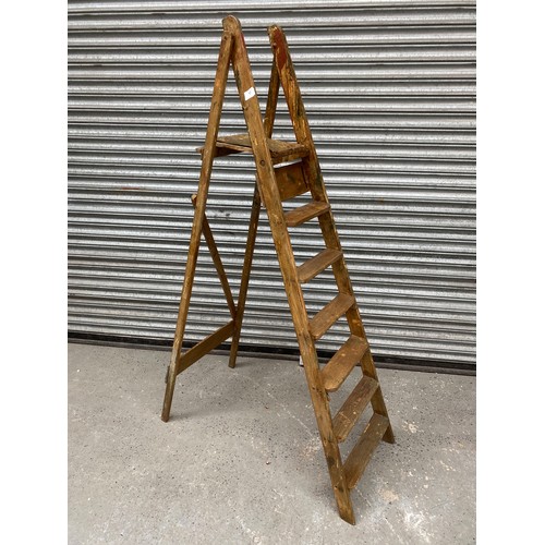 57 - Set of wooden vintage step ladders.