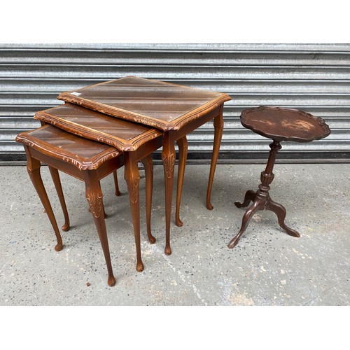 59 - Carved Nest of tables with glass tops and small side table.