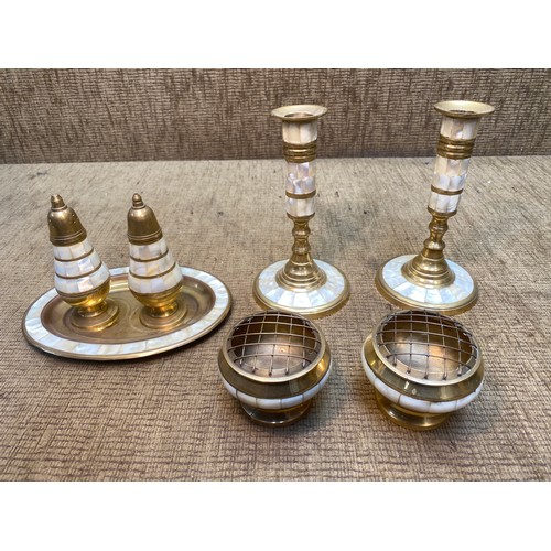 689 - Set of brass and mother of Pearl Cruet set, candle sticks and posy holders.