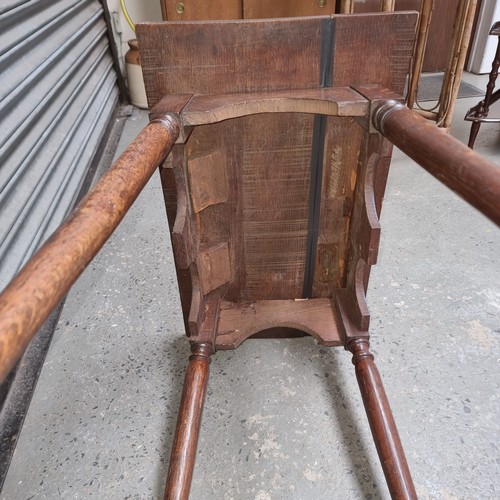 691 - A solid oak occasional table with a beautiful carved top.